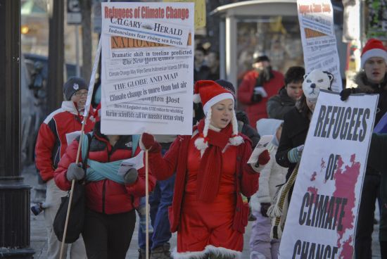 On the streets of Calgary, Alberta, Canada: Climate-induced migration is more and more regarded as a national security problem (Credit: Visible Hand 2007)