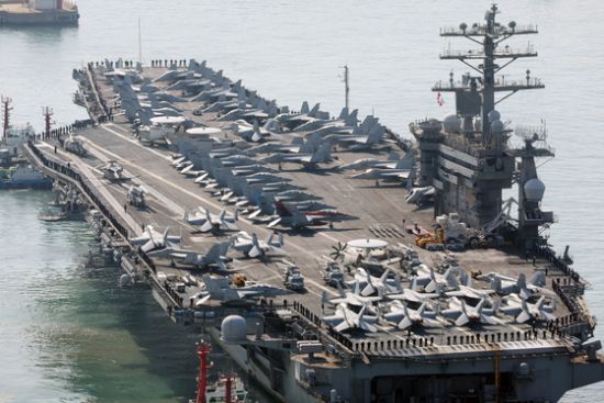 The US aircraft carrier Nimitz arrived in Busan on March 28: The immediate benefit of the warming of Seoul-Tokyo ties will be better sharing of information, especially relating to North Korea (Credit: Yonhap)