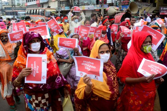 Calling on Amazon for better pay and conditions, Dhaka, November 2020: Brands can pursue responsible practices such as providing suppliers with health and safety guidelines (Credit: Mamunur Rashid / Shutterstock.com)