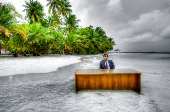 Disappearing islands: In 2009, to make a point about his country’s climate challenge posed by rising sea levels, then president of the Maldives Mohamed Nasheed staged this photo shoot (Credit: Presidency Maldives)