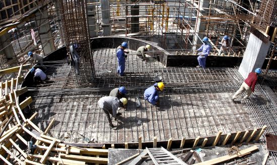 Building other people's economies – and their own, too: Some 13 million Bangladeshi migrant workers contribute US$15 billion to their country’s economy every year, with about 30 million family members depending on that income (Credit: Apex Image/ILO)