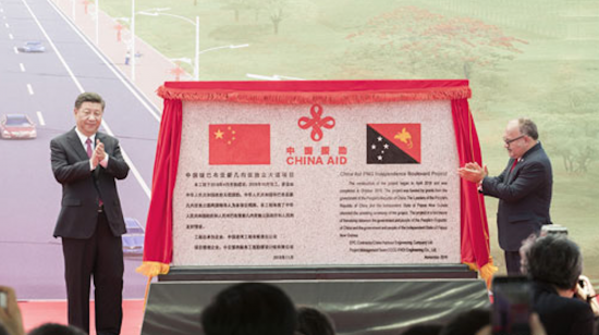 Xi Jinping and the prime minister of Papua New Guinea mark the launch of a China-financed road project, 2018 (Credit: Ministry of Foreign Affairs of the People's Republic of China)