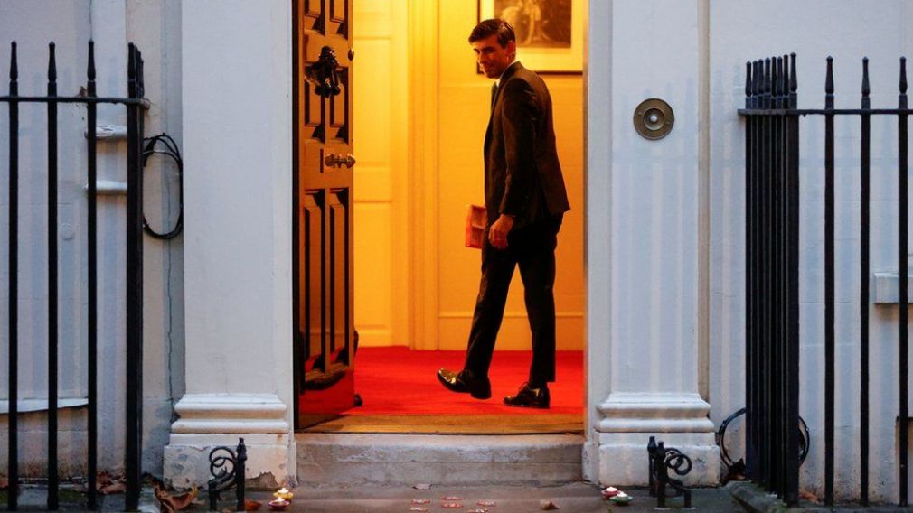 Diwali delight: In November 2021, then British finance minister Sunak lit festive candles on the doorstep of his office and residence on Downing Street (Credit: Stefan Rousseau/PA)