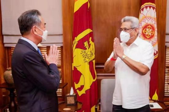 Romancing the president: Chinese Foreign Minister Wang Yi greets Gotabaya Rajapaksa in Colombo, January 10, 2022 (Credit: Foreign Ministry of the People's Republic of China)