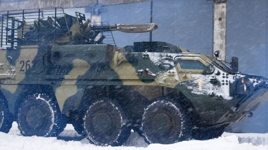 Ukrainian army armed personnel carrier on maneuver in Kharkiv, near the border with Russia: Moscow is standing firm in defense of its position (Credit: Seneline / Shutterstock.com)