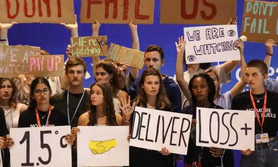 Youth activists at COP27 in Sharm el-Sheikh, Egypt: Some level of globalized shared interest is needed if there is to be any hope of reconciling the Global North with the Global South (Credit: Sedat Suna/EPA)
