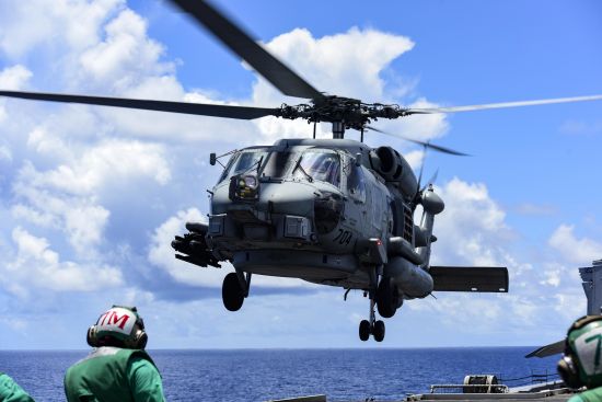 Great power show: American Seahawk helicopter lands on the flight deck of the USS Ronald Reagan aircraft carrier while conducting operations in the South China Sea, August 2020 (Credit: Navy Petty Officer 3rd Class Jason Tarleton/US Department of Defense)