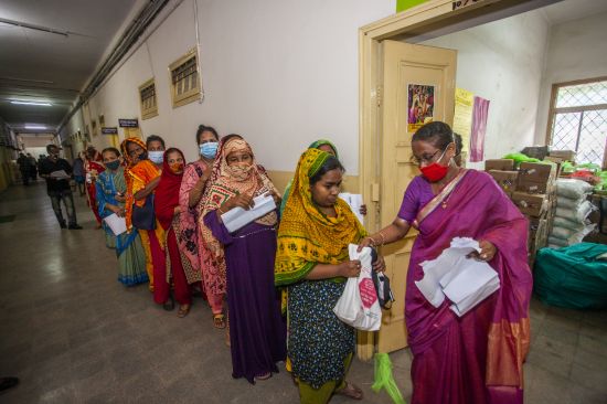 The pandemic piled uncertainty and stress on top of already considerable hardship: In Dhaka, women migrant workers who had to return to Bangladesh receive Covid-19 prevention kits (Credit: Fahad Kaizer/UN Women) 