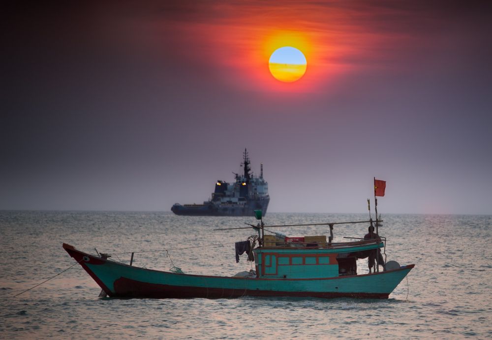 Ease Tensions in the South China Sea by Adopting Cooperative Mechanisms