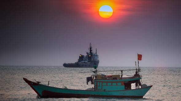 Ease Tensions in the South China Sea by Adopting Cooperative Mechanisms