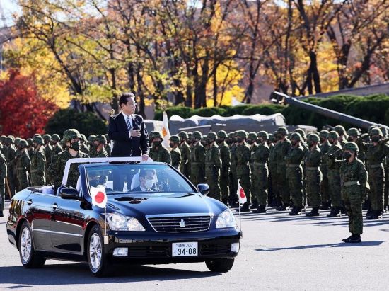Prime Minister Kishida reviews Self-Defense Forces troops on the anniversary of their establishment, November 27, 2021: A pacifist Constitution means that Japan relies on the US for its strategic defense (Credit: Prime Minister’s Office of Japan)