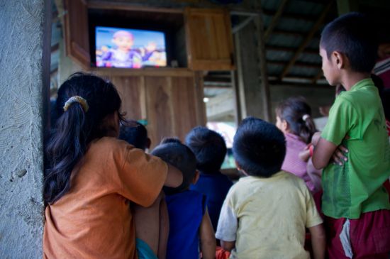 Watching a show in Sumba: Poor households may not be able to afford the necessary equipment to support digital TV (Credit: Asian Development Bank)