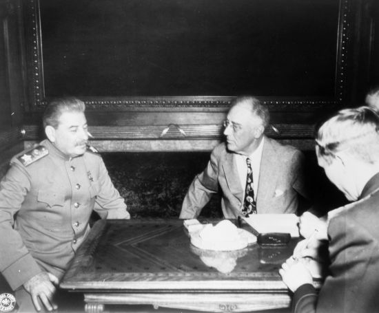 Dictator Stalin and the patrician president: Roosevelt’s critics drew parallels between his big-spending infrastructure and social-welfare programs and the Soviet Union’s crash industrialization effort. (Credit: US Office of War Information)