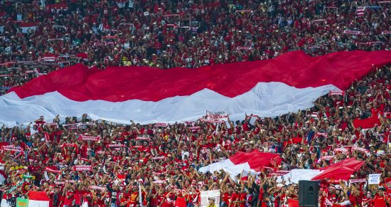 Football frenzy in Selangor, Malaysia, August 26, 2017: The revocation of Indonesia’s right to host the U-20 World Cup disappointed the country’s football fans, particularly the youth (Credit: Abdul Razak Latif / Shutterstock.com)